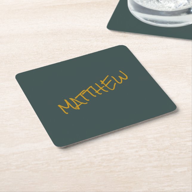Dark green modern gold lettering script square paper coaster (Angled)