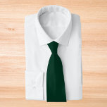 Dark Green Solid Color Tie<br><div class="desc">Dark Green Solid Color.
A deep, lush forest green that exudes tranquility and strength. This captivating hue evokes the serene beauty of dense woodland and the rich depth of pine foliage. This sophisticated shade brings a touch of timeless elegance. This color offers a perfect balance of calmness and intensity.</div>