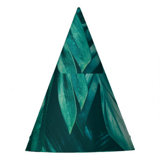 Dark green, tropical jungle foliage. party hat