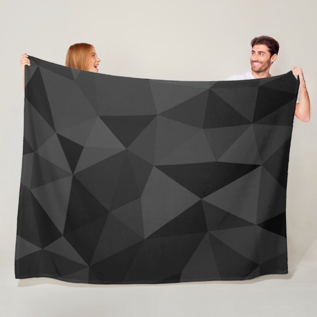 Dark grey and black geometric mesh pattern fleece blanket (In Situ)