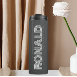 Dark Grey Modern Typography Personalized Name Thermal Tumbler<br><div class="desc">Keep hot beverages hot and cold beverages cold with this trendy,  insulated thermal tumbler that is a dark grey colour along with name printed in white,  modern typography. Edit your thermal tumbler and replace name with desired name. Perfect for a birthday gift,  wedding groomsman gift,  etc.</div>