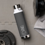 Dark Grey Modern Typography Personalized Water Bottle<br><div class="desc">Trendy,  vacuum insulated water bottle that features personalized name in white,  modern typography on a dark grey colour background. Personalize bottle by editing and replacing name with your own as desired. Perfect for a birthday gift,  wedding groomsman gift,  etc. Select your water bottle style. Select your water bottle style.</div>