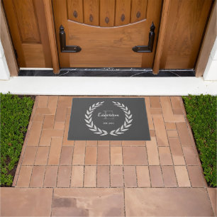 Dark grey rustic wreath family name Est. Doormat