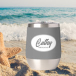 Dark Grey Stylized Wedding Bridesmaid Name<br><div class="desc">Gift your wedding bridesmaid with this trendy and personalized, stainless steel wine tumbler with her name in stylized script inside a white, oval design. Background colour and script is a dark grey colour. Perfect for a bachelorette party as well! Personalize your wine tumbler by editing and replacing bridesmaid name with...</div>