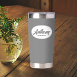 Dark Grey Stylized Wedding Groomsman Name Insulated Tumbler<br><div class="desc">Gift your wedding groomsman with this trendy and personalized,  stainless steel,  thermal tumbler with his name in stylized script in a white oval design. Background and script is a dark grey colour. Personalize your thermal tumbler by editing and replacing groomsman's name with desired name.</div>