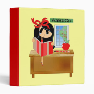 Dark Haired Girl at School Desk Reading Binder