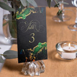 Dark Moody Emerald Bronze Abstract Table Number<br><div class="desc">A modern ink washed wedding table number with emerald green and liquid gold and bronze on a black background. This elegant wedding table number card features an artistic wash of colourful inks in emerald green and golden bronze. Easily edit the template using Zazzle's customization tool. Please contact us if you...</div>