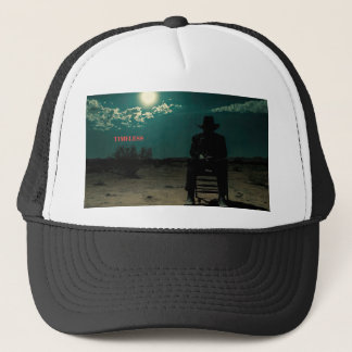 Dark Outlaw Sitting in the Desert Trucker Hat