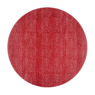 Dark red artificial leatherette closeup. cutting board