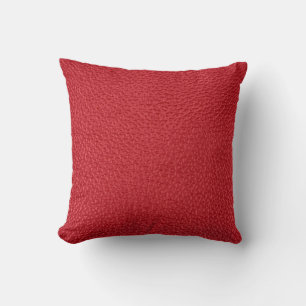 Dark red artificial leatherette closeup. throw pillow