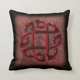 Dark red celtic knot on leather throw pillow