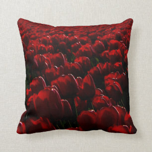 Dark red tulips, real tulip field image, floral throw pillow