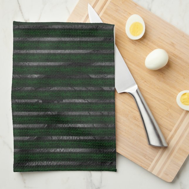 Dark rough stripes over stained abstract design kitchen towel (Quarter Fold)