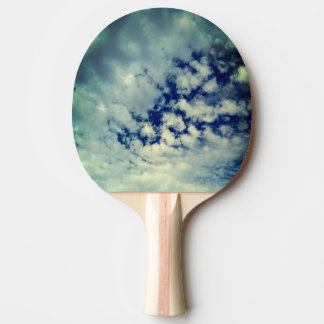 Dark sky , peeping through the clouds ping pong paddle