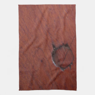 dark wood grain surface kitchen towel