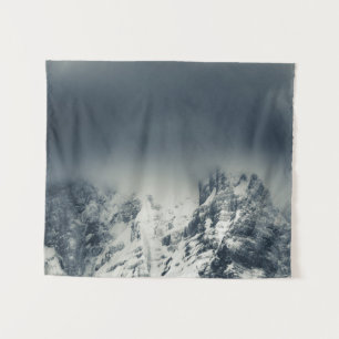 Darkness and clouds covering mountain tapestry