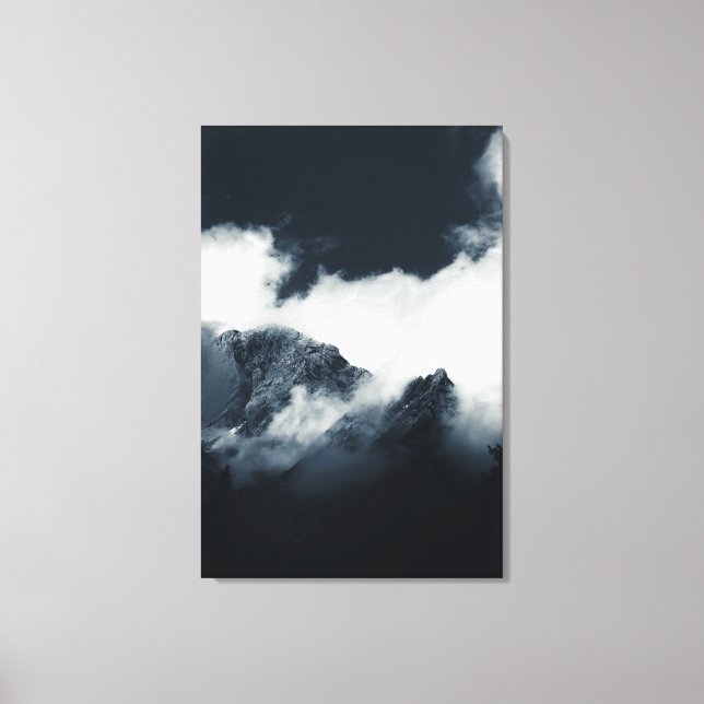 Darkness and mountains wrapped in clouds canvas print (Front)