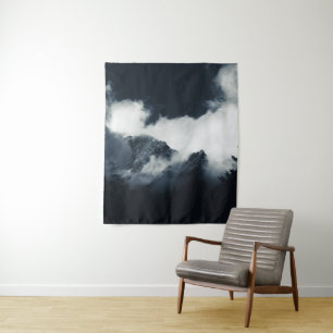 Darkness and mountains wrapped in clouds tapestry