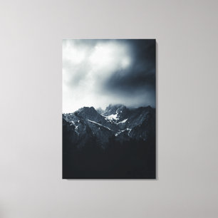 Darkness and storm brewing at mountains canvas print