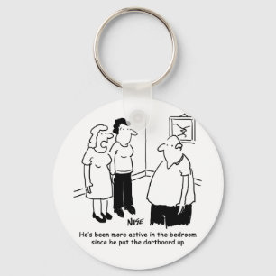 Dartboard in the Bedroom. Funny Cartoon Keychain