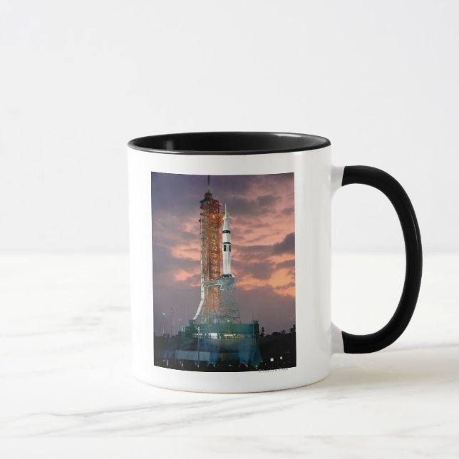 Dawn breaks behind ASTP Saturn IB CDDT Mug (Right)
