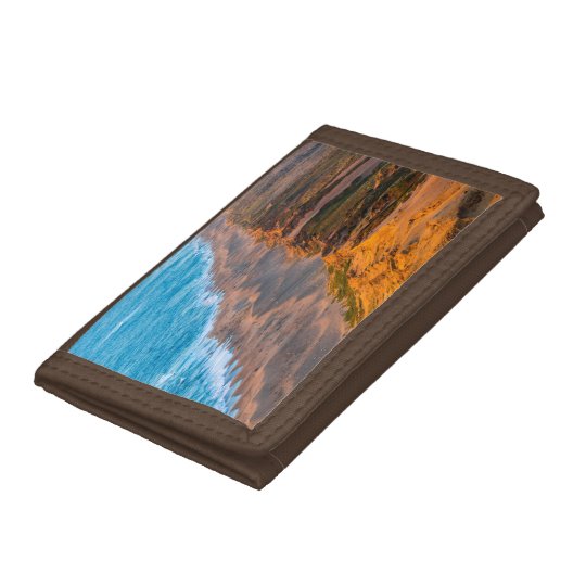 Days Last Light Strikes The Sandy Shore Of Point Trifold Wallet