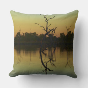 Dead trees reflected in Lily Creek Lagoon, dawn Throw Pillow