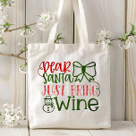 Dear Santa Just Bring Wine Modern Typography Tote Bag<br><div class="desc">This holidays design features the text "Dear Santa just bring wine" in modern red and green typography accented with a bow and snowman. #christmas #holidays #seasonal #festive #modern #chic #stylish #fun #cool #funny #humor #wine #tote #totebags #bags #accessories #christmasgifts #christmasstyle #fashion #fashionable #style #trendy</div>