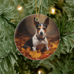 Décoration En Céramique Rat Terrier dans les feuilles d'automne qui tomben
