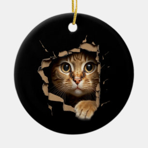 Décoration En Céramique Regards de mignon chaton depuis un tissu déchiré C