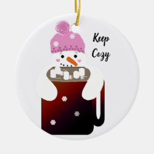 Décoration En Céramique Un bonhomme de neige qui serre une tasse de chocol