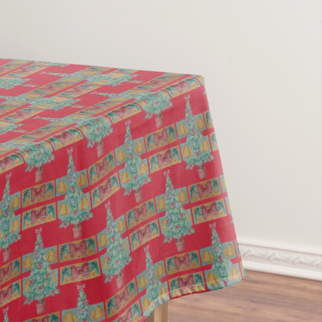 decorations bells and red bows on tree christmas tablecloth (In Situ)