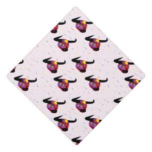 Decorative bull heads on purple graduation cap topper