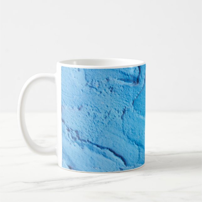 Decorative cement on a wall texture.abstract, aged coffee mug (Left)
