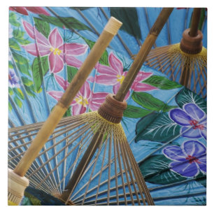 Decorative hand painted umbrellas in the village tile