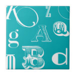Decorative Letters on Blue Background Tile<br><div class="desc">A veritable alphabet soup awaits you when you purchase this print of decorative letters on a blue background. A Vision Studio creation,  this would be a great addition to a kid's room or their playroom. Order a print today!</div>