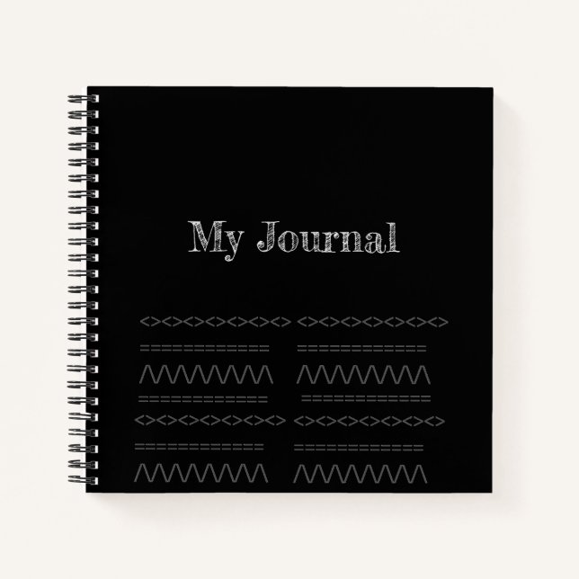 Decorative print on black spiral notebook (Front)