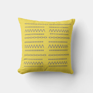 Decorative print on yellow throw pillow
