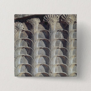 Decorative relief from the east stairway 2 inch square button