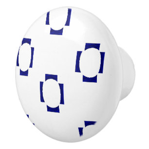 decorative shapes on white ceramic knob
