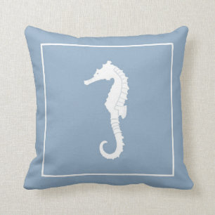 Decorative throw pillow with seahorse.