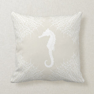 Decorative throw pillow with seahorse and coral