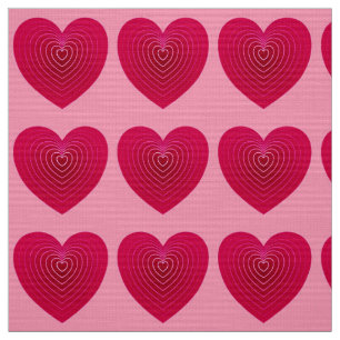 Deep rose red hearts on a pale pink background fabric