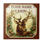 Deer Cabin Personalized with Wood Grain Tile<br><div class="desc">This rustic country tile coaster is perfect for adding a personalized touch to your cabin, lodge or home that features nature / animal decor. It shows a vintage image of a buck deer / reindeer with large antlers, recolored to add brightness and clarity, nestled between pine tree boughs. The background...</div>