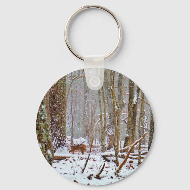 Deer in the snow, licking keychain (Front)