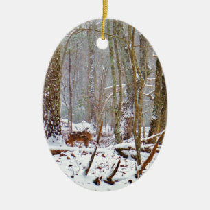Deer in the snow, licking leg ceramic ornament