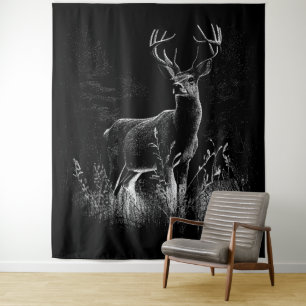 Deer with antlers framed by field and tree tapestry