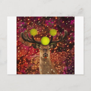 Deer with tennis balls in a shining forest . postcard