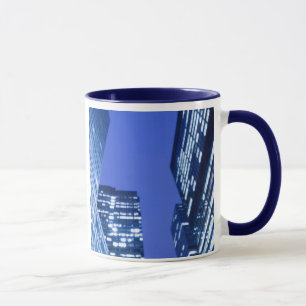 Defocused upward view of office building windows mug