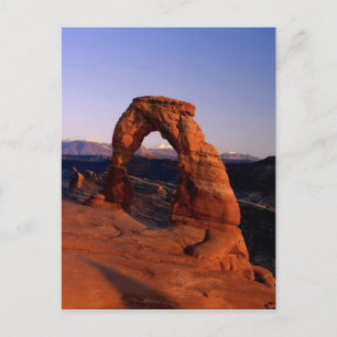 Delicate Arch at Sunset with snow covered La Postcard
